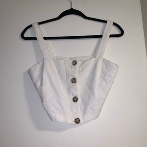 Fitted crop top with tortoise shell buttons
